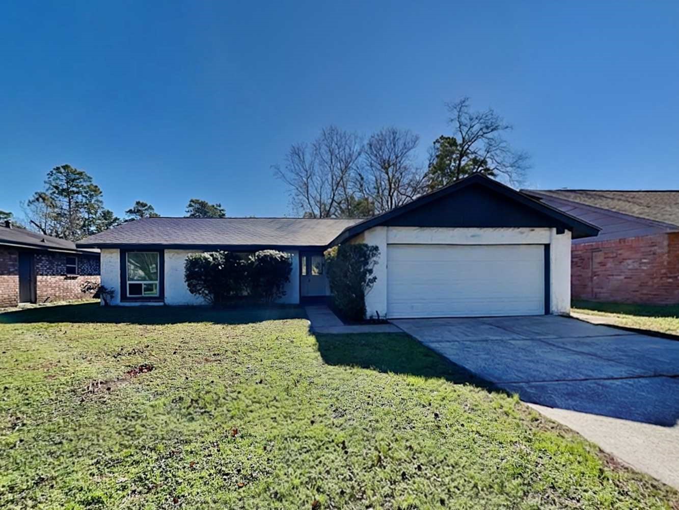 4434 Algernon Drive Spring, TX 77373 - Photo 1 of 17 a front view of a house with a yard