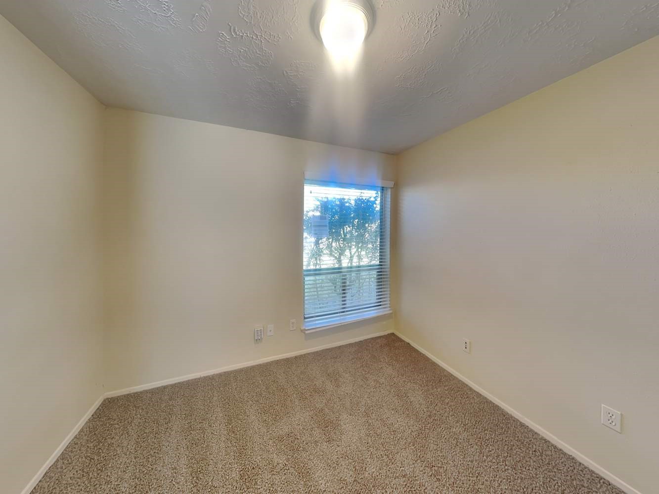 4434 Algernon Drive Spring, TX 77373 - Photo 12 of 17 an empty room with a empty space and windows