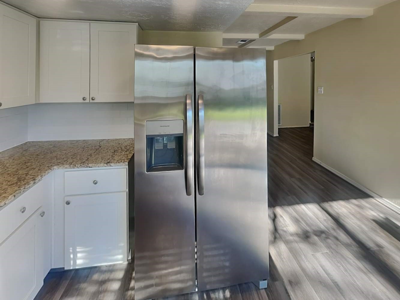 4434 Algernon Drive Spring, TX 77373 - Photo 7 of 17 a kitchen with a refrigerator and a sink