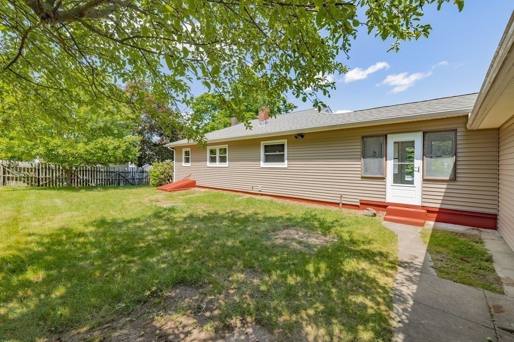 10 Sibley Street Three Rivers, MA 01080 - Photo 6 of 18 a backyard of a house with seating space