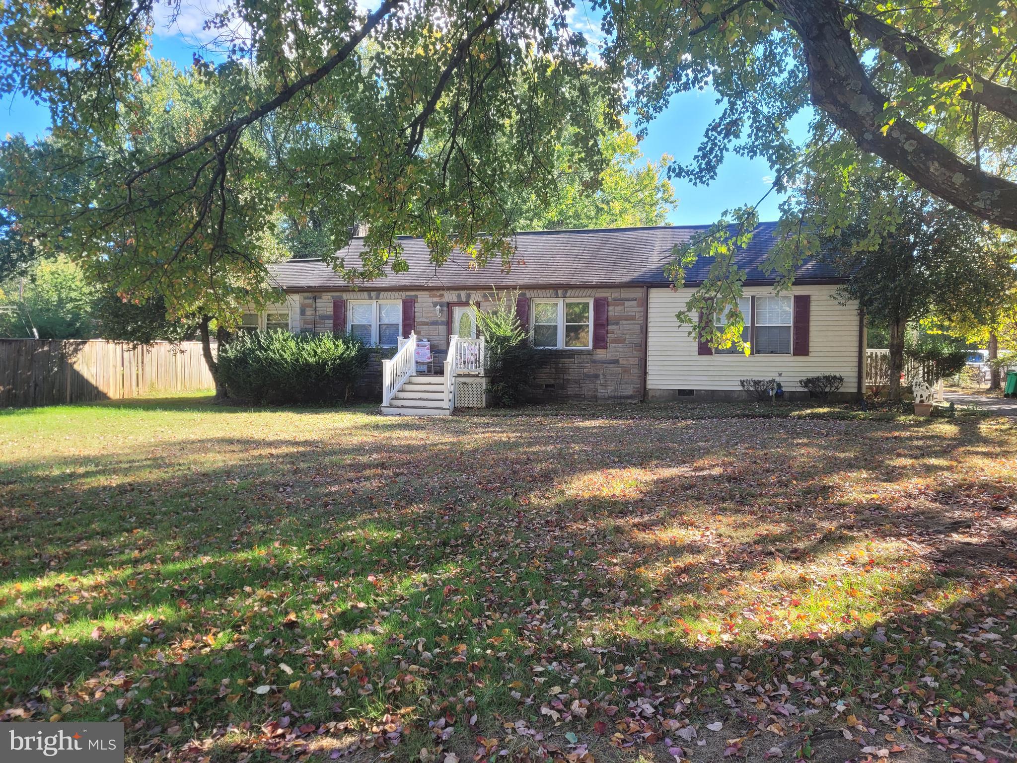 10926 Riverview Road Fort Washington, MD 20744 - Photo 1 of 15 a front view of a house with yard and green space