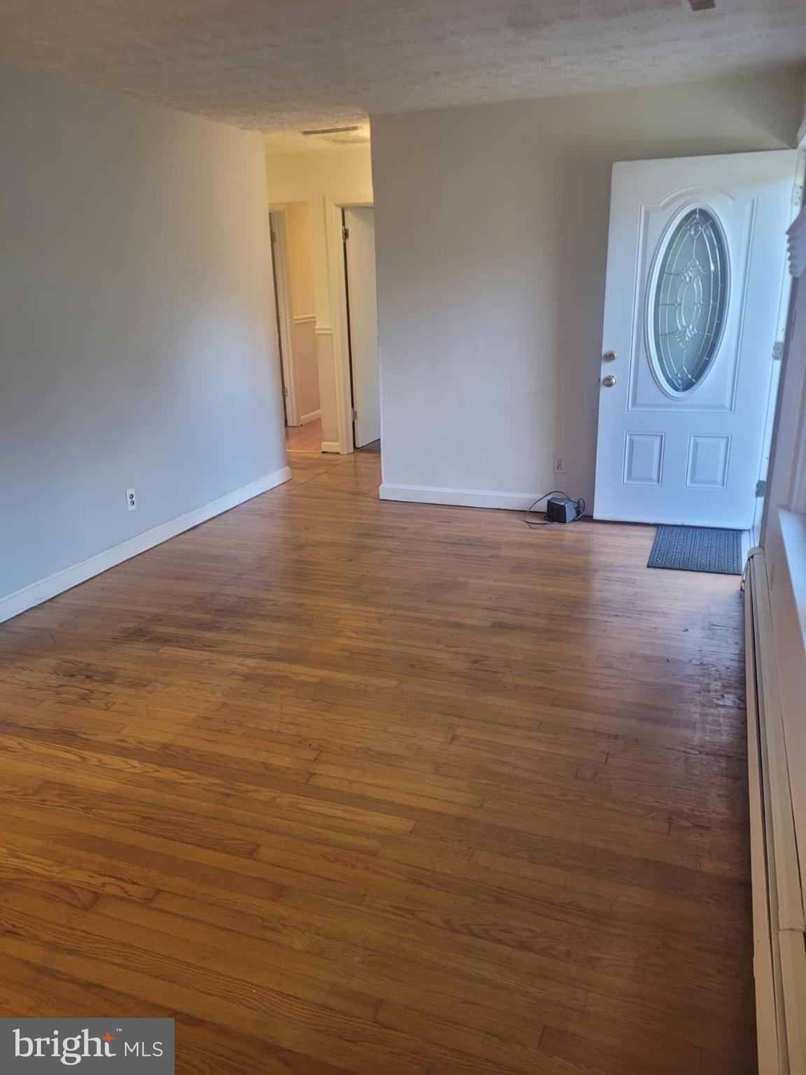 10926 Riverview Road Fort Washington, MD 20744 - Photo 13 of 15 a view of empty room with wooden floor