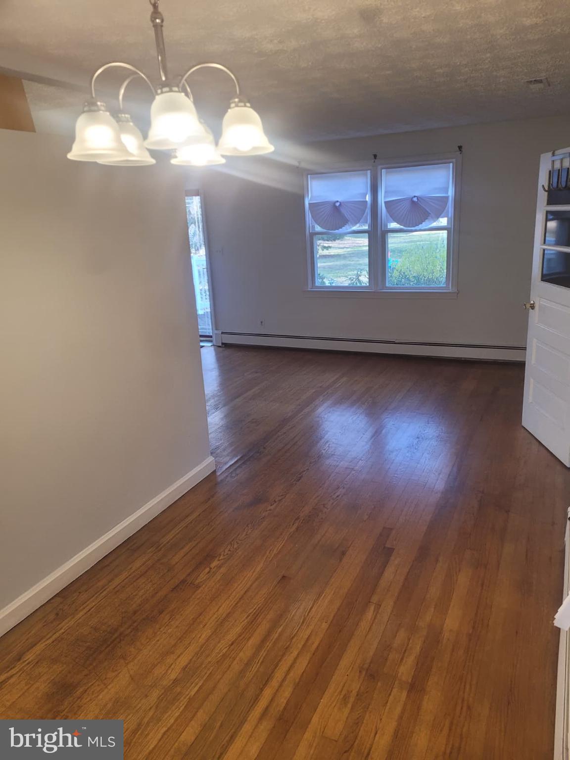 10926 Riverview Road Fort Washington, MD 20744 - Photo 15 of 15 a view of a room with wooden floor and windows