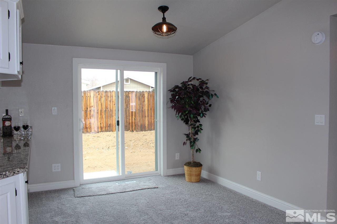 5189 Coggins Road Reno, NV 89506 - Photo 11 of 33 a view of an empty room and window