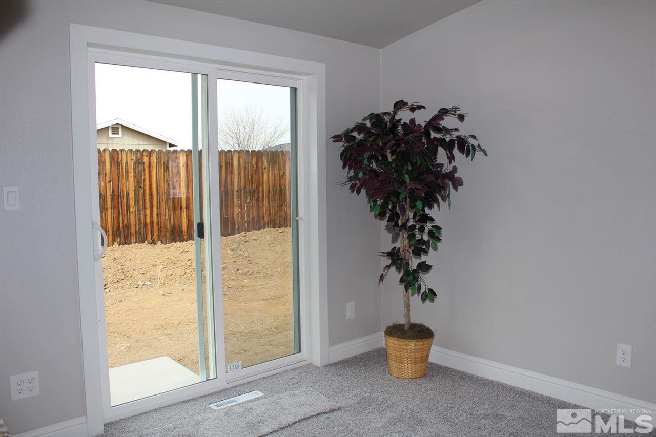 5189 Coggins Road Reno, NV 89506 - Photo 14 of 33 a view of a potted plant in front of a window