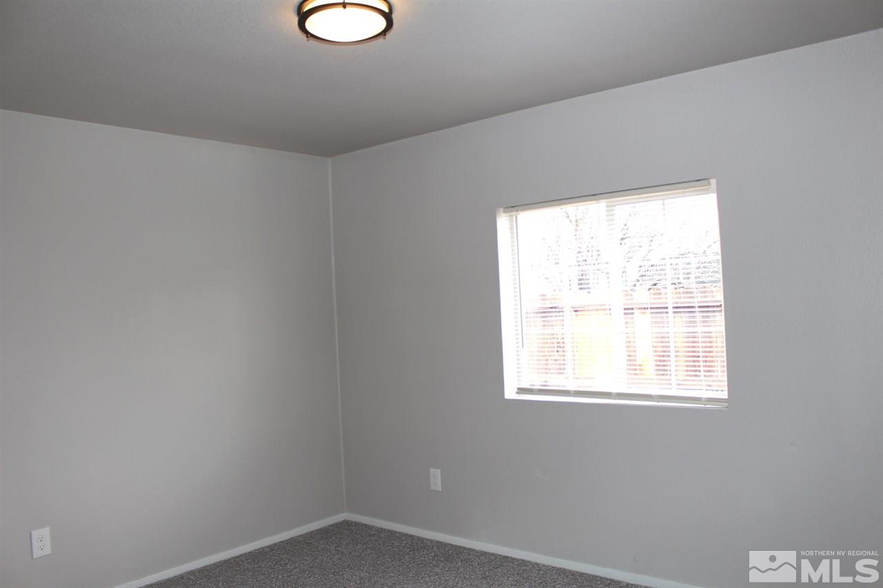 5189 Coggins Road Reno, NV 89506 - Photo 24 of 33 an empty room with a window