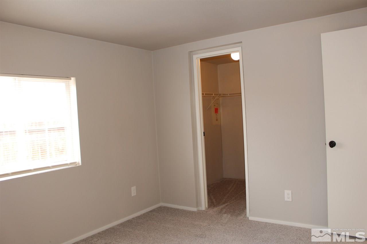 5189 Coggins Road Reno, NV 89506 - Photo 27 of 33 a view of an empty room with a window