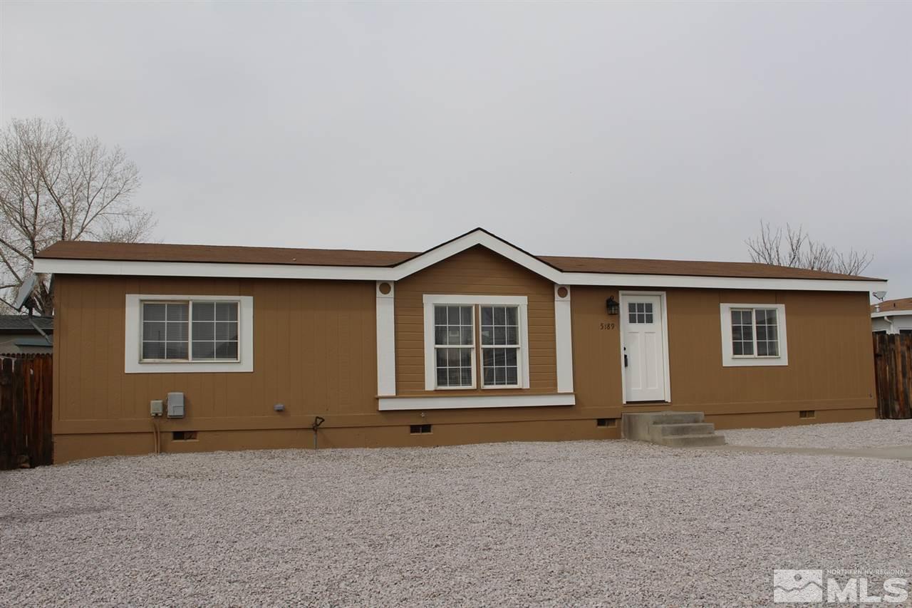 5189 Coggins Road Reno, NV 89506 - Photo 33 of 33 a front view of a house with yard