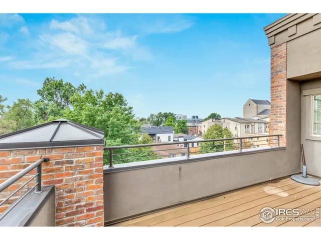 a view of a balcony with an outdoor space