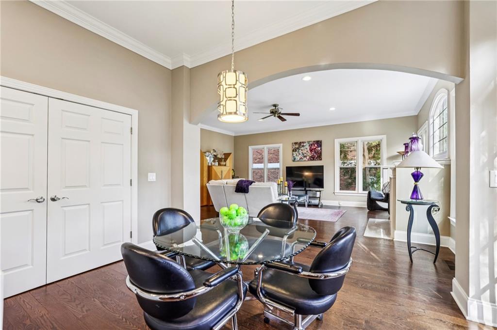 3519 High Grove Way Atlanta, GA 30319 - Photo 12 of 38 a living room with furniture a wooden floor and a large window