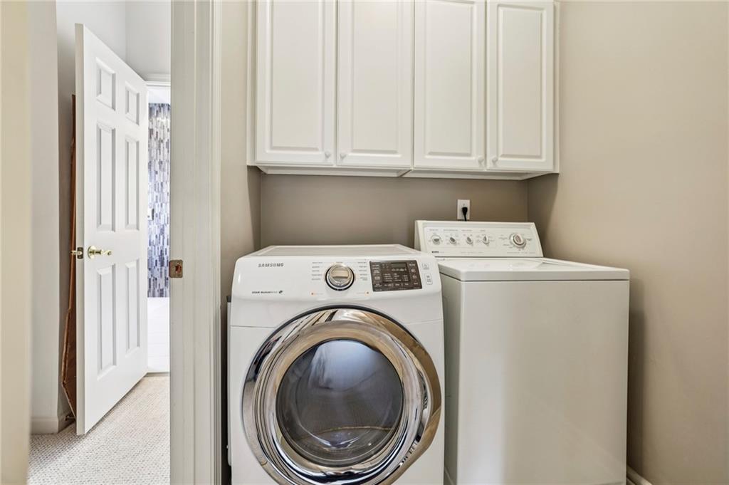 3519 High Grove Way Atlanta, GA 30319 - Photo 15 of 38 a utility room with dryer and washer