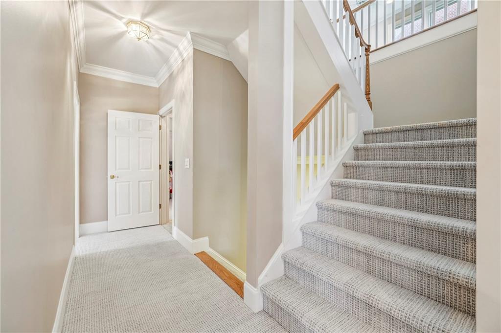 3519 High Grove Way Atlanta, GA 30319 - Photo 16 of 38 a view of staircase with white walls and white walls