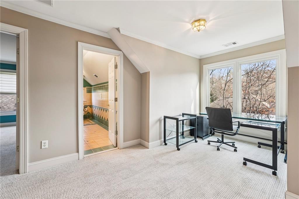 3519 High Grove Way Atlanta, GA 30319 - Photo 30 of 38 a view of a workspace with furniture and a window