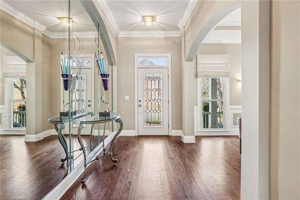 3519 High Grove Way Atlanta, GA 30319 - Photo 3 of 38 a view of an entryway with wooden floor and windows