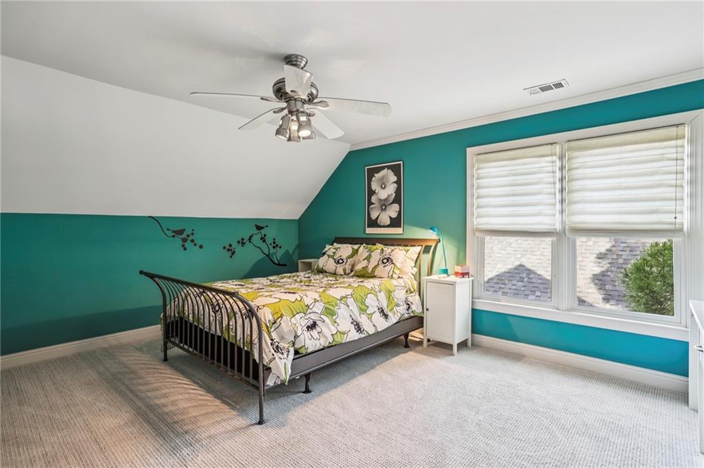 3519 High Grove Way Atlanta, GA 30319 - Photo 31 of 38 a bedroom with a bed and a window