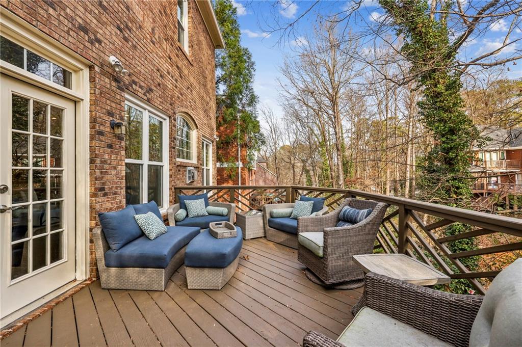 3519 High Grove Way Atlanta, GA 30319 - Photo 33 of 38 a roof deck with couches and wooden floor