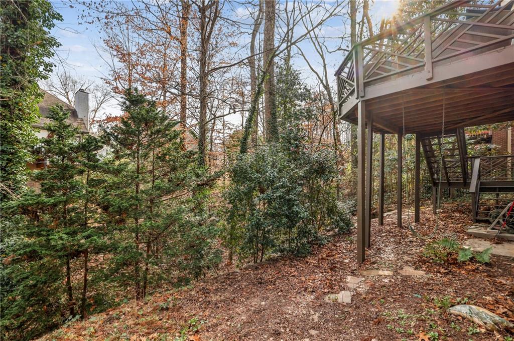 3519 High Grove Way Atlanta, GA 30319 - Photo 35 of 38 a view of a backyard with large trees