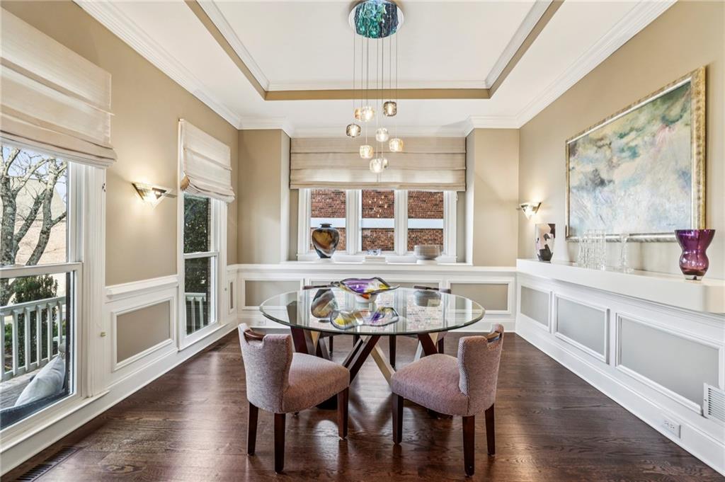 3519 High Grove Way Atlanta, GA 30319 - Photo 4 of 38 a view of a dining room with furniture window and wooden floor