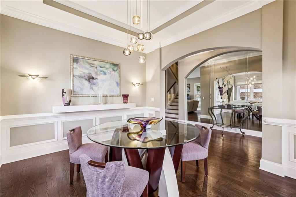 3519 High Grove Way Atlanta, GA 30319 - Photo 5 of 38 a view of a dining room with furniture and wooden floor