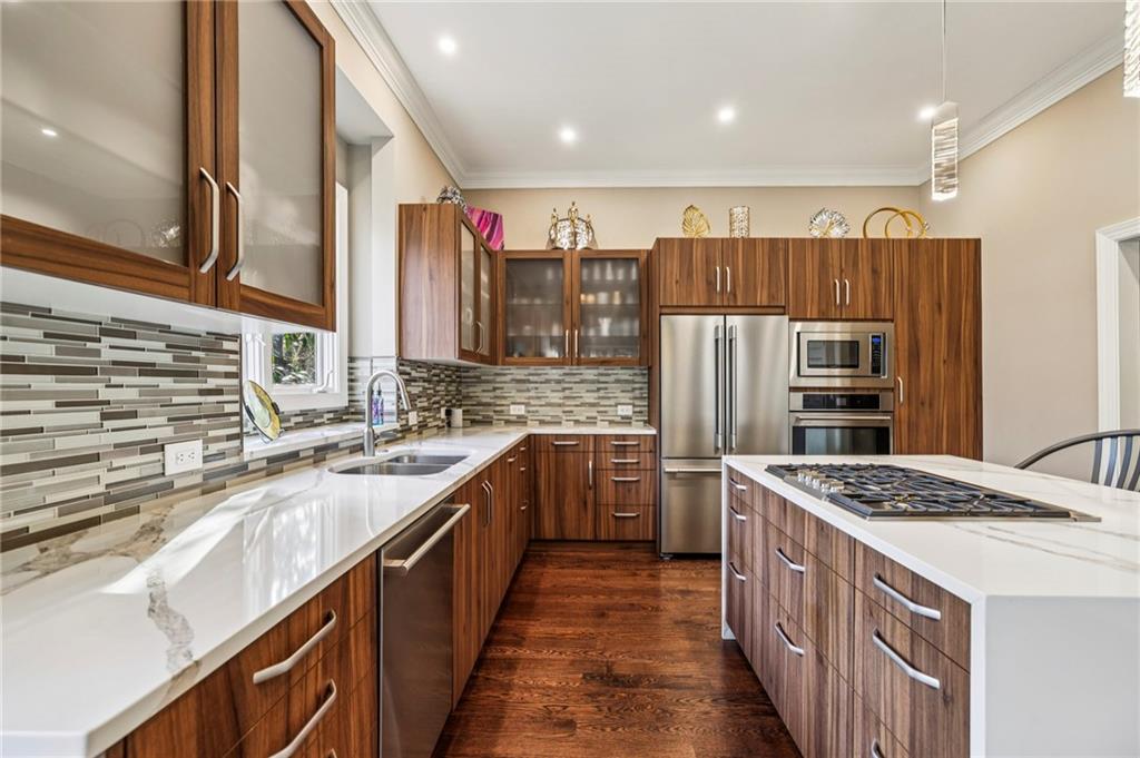 3519 High Grove Way Atlanta, GA 30319 - Photo 10 of 38 a kitchen with stainless steel appliances granite countertop a sink stove and refrigerator
