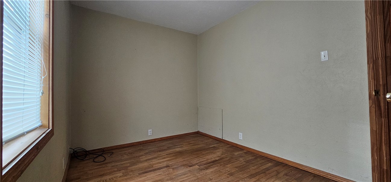 206 East Fifth Street St. Peter, IL 62880 - Photo 18 of 23 a view of an empty room and wooden floor