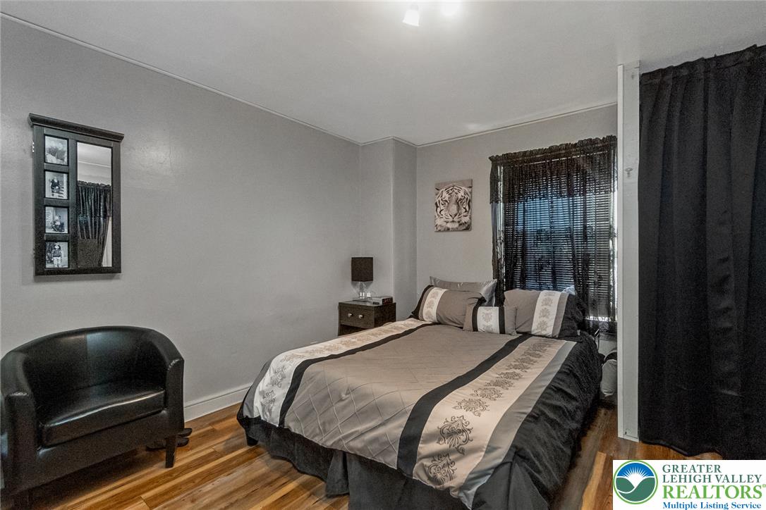 365 Rock Street Easton, PA 18042 - Photo 24 of 50 Well-lit sleeping quarters with rich hardwood flooring for quiet relaxation.