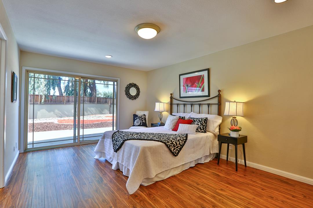 6195 Flowering Plum Road San Jose, CA 95120 - Photo 15 of 22 a living room with furniture and a lamp