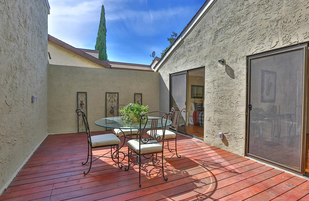 6195 Flowering Plum Road San Jose, CA 95120 - Photo 18 of 22 a patio with table and chairs