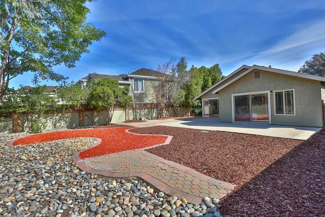 6195 Flowering Plum Road San Jose, CA 95120 - Photo 20 of 22 a front view of a house with yard