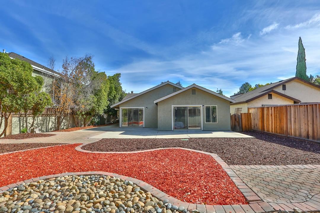 6195 Flowering Plum Road San Jose, CA 95120 - Photo 22 of 22 a front view of a house with a yard