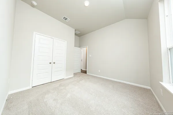 an empty room with an entryway