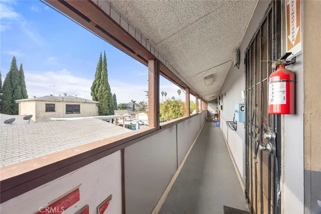a view of balcony with wooden floor and outdoor space