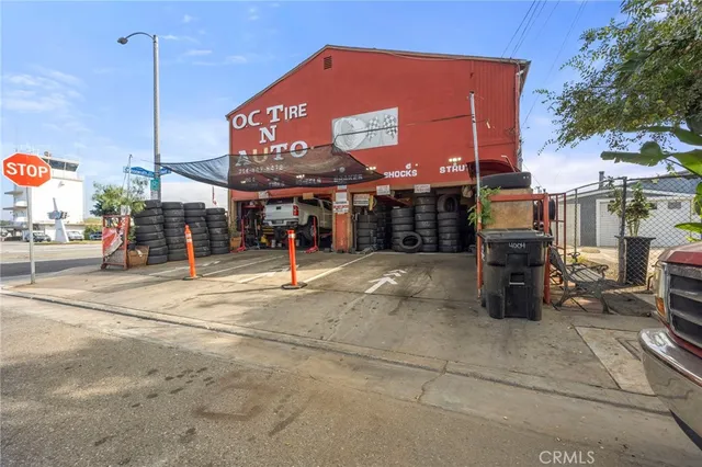 a view of a street with shops