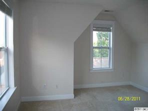 557 Jetton Street Davidson, NC 28036 - Photo 11 of 16 an empty room with a window