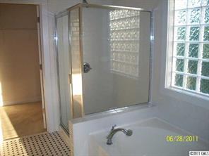 557 Jetton Street Davidson, NC 28036 - Photo 16 of 16 a bathroom with a shower