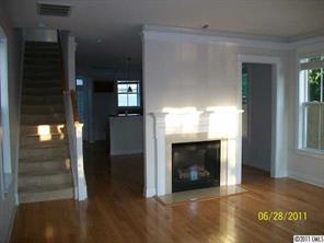 557 Jetton Street Davidson, NC 28036 - Photo 4 of 16 a view of a livingroom with a fireplace