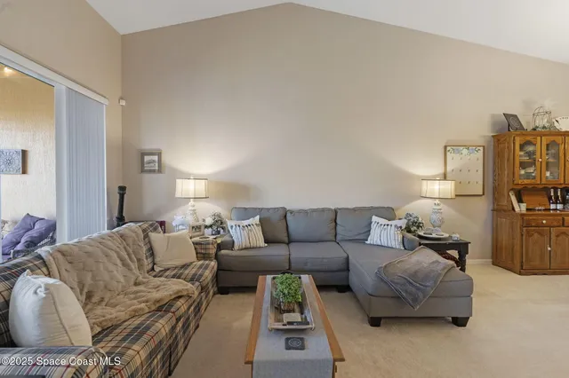 a living room with furniture and a couch