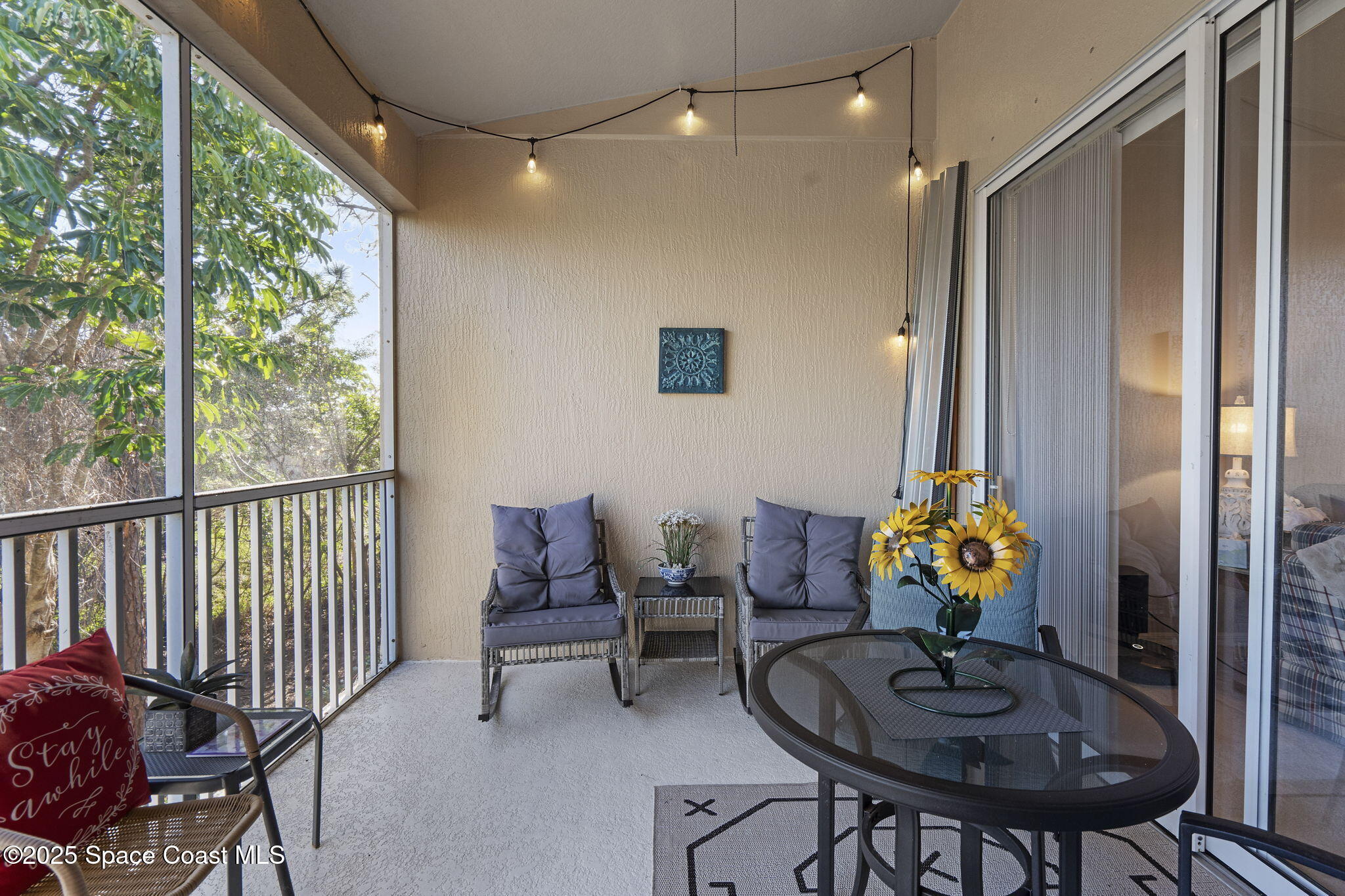 401 Trotter Lane, Unit 202 Melbourne, FL 32940 - Photo 31 of 38 Screened Patio