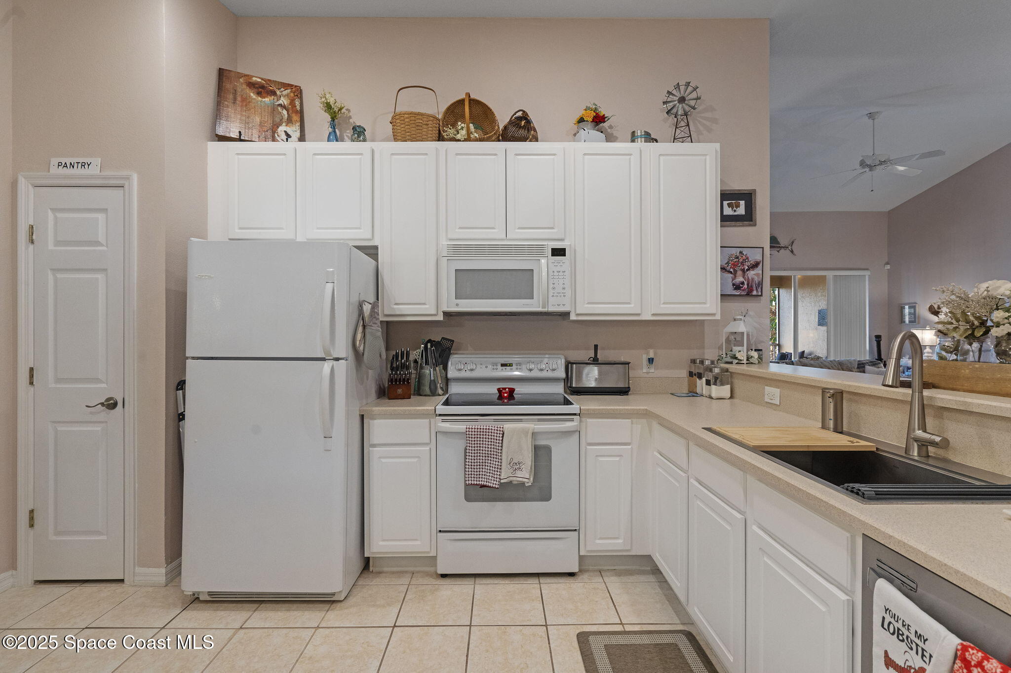 401 Trotter Lane, Unit 202 Melbourne, FL 32940 - Photo 33 of 38 Kitchen