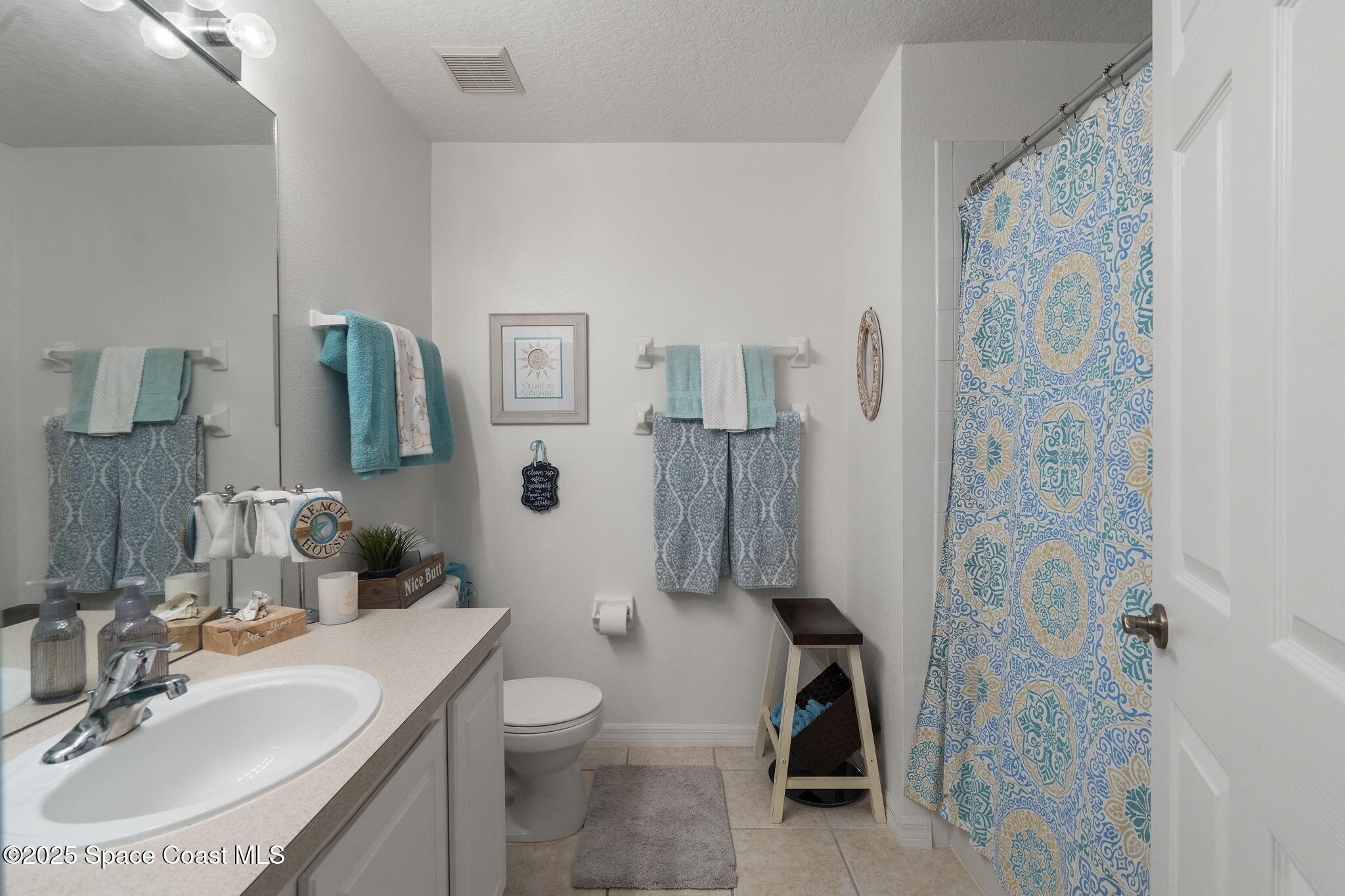 401 Trotter Lane, Unit 202 Melbourne, FL 32940 - Photo 38 of 38 a bathroom with a sink toilet and shower