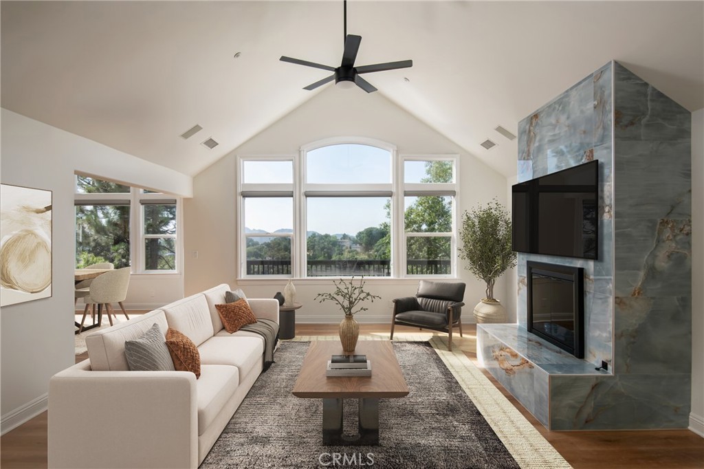 1477 Sequoia Drive Lake Arrowhead, CA 92352 - Photo 2 of 25 a living room with fireplace furniture and a flat screen tv