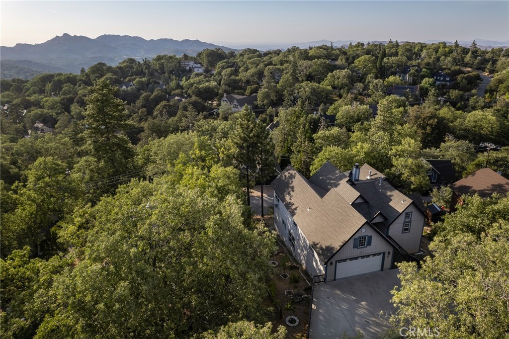 1477 Sequoia Drive Lake Arrowhead, CA 92352 - Photo 22 of 25 an aerial view of a house with a yard