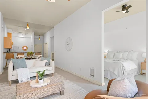 a living room with furniture and a table