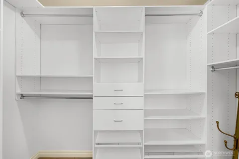 a view of an empty walk in closet