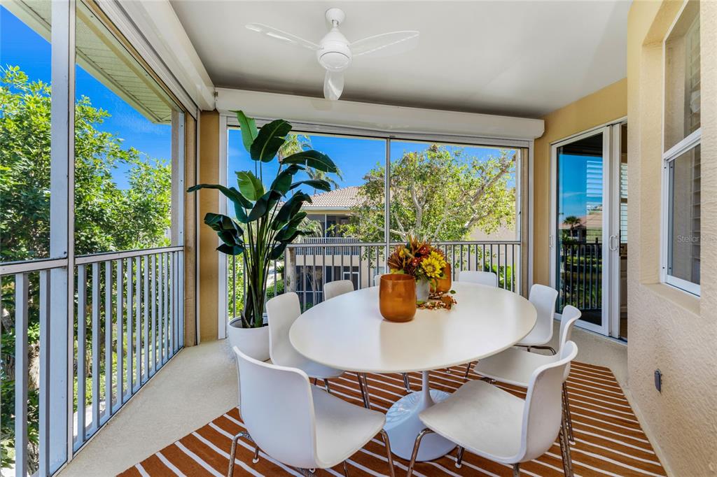 3316 Sunset Key Circle, Unit D Punta Gorda, FL 33955 - Photo 16 of 68 a dining room with furniture and a potted plant
