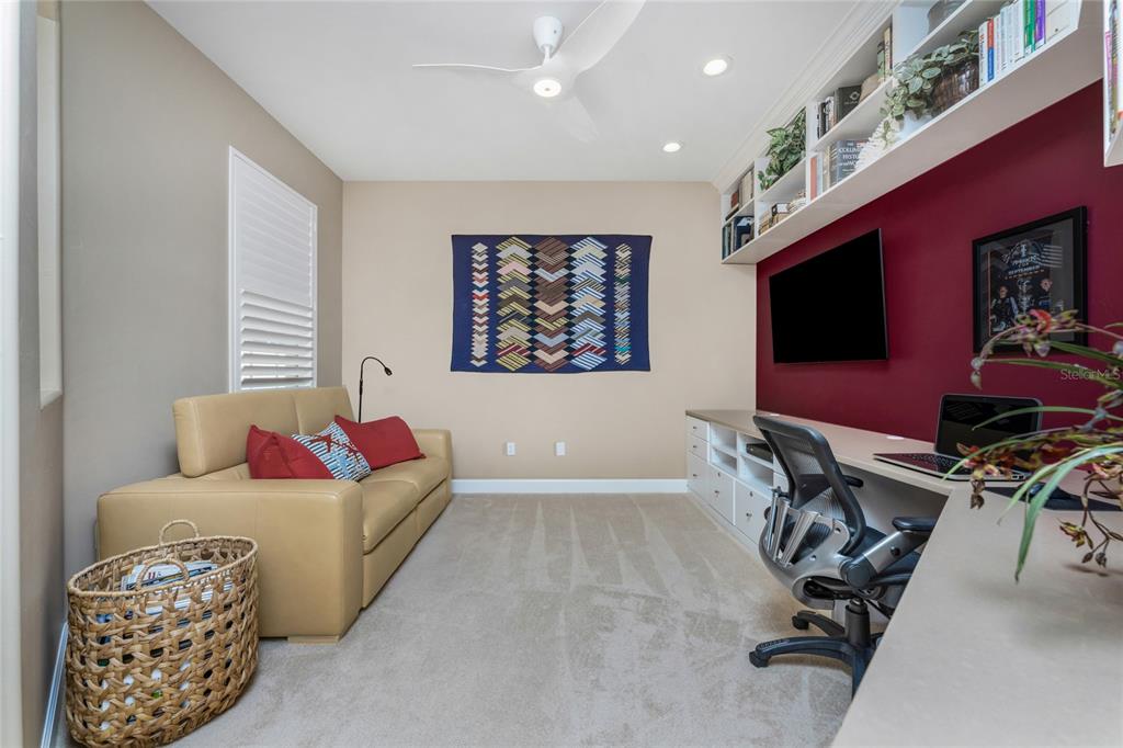3316 Sunset Key Circle, Unit D Punta Gorda, FL 33955 - Photo 22 of 68 a living room with furniture and a flat screen tv