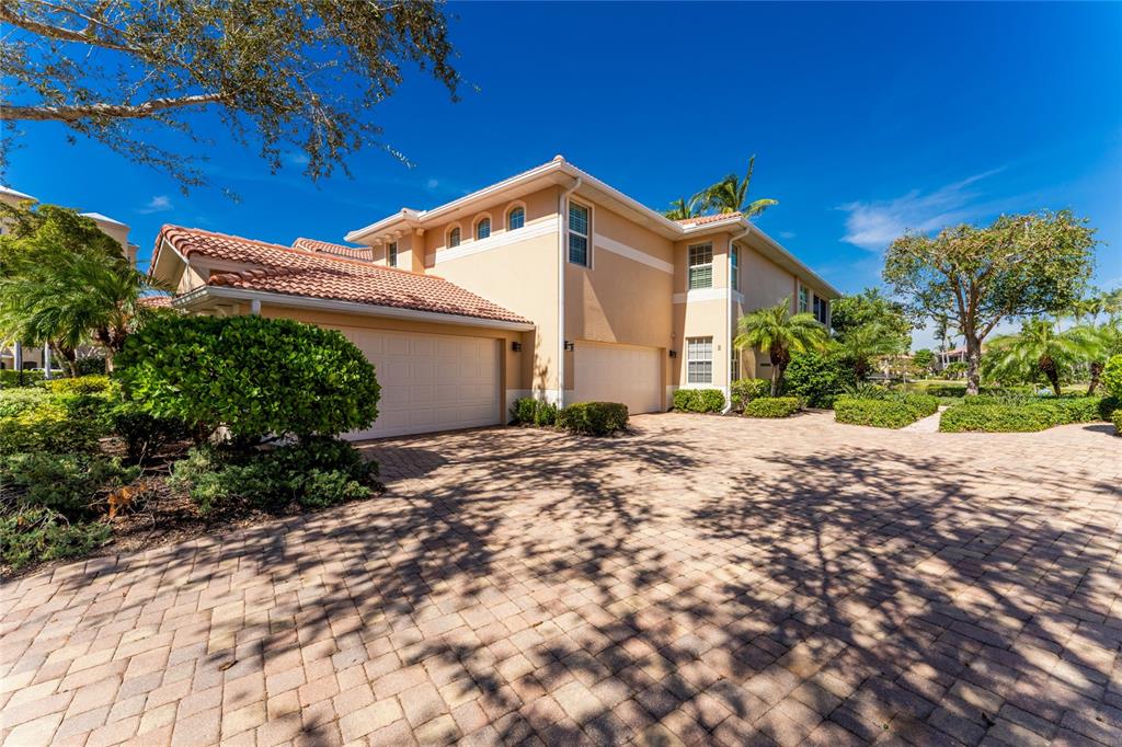 3316 Sunset Key Circle, Unit D Punta Gorda, FL 33955 - Photo 40 of 68 a view of a house with a yard