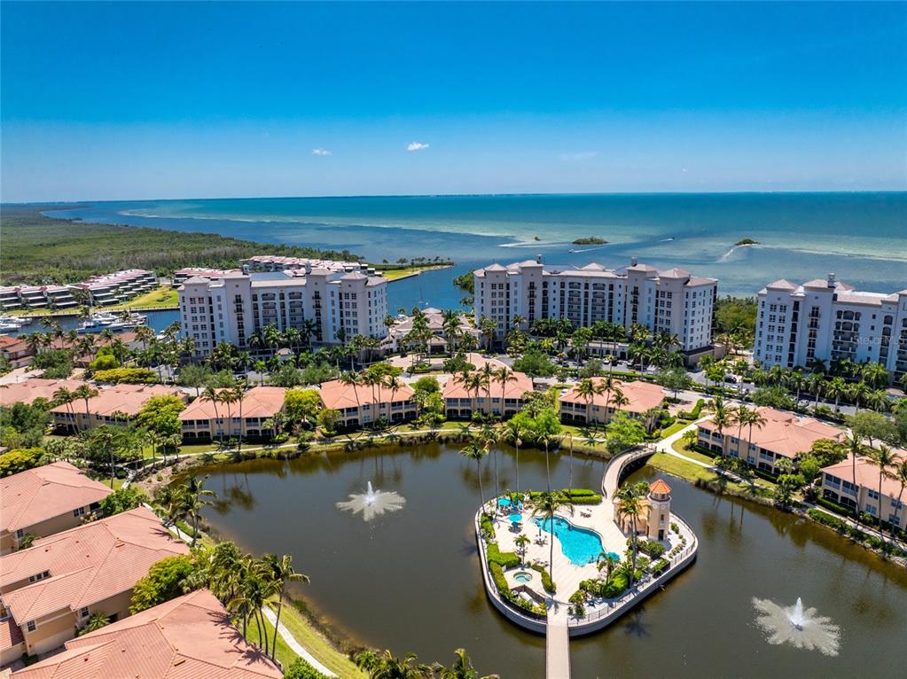 3316 Sunset Key Circle, Unit D Punta Gorda, FL 33955 - Photo 47 of 68 a view of a lake with a chairs