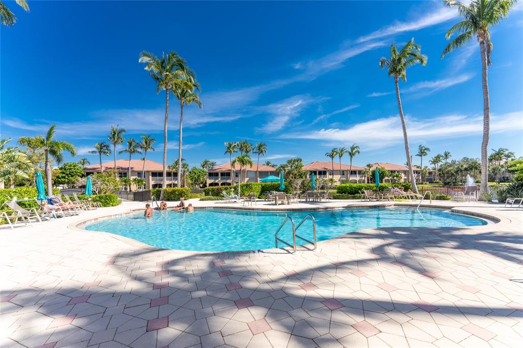 3316 Sunset Key Circle, Unit D Punta Gorda, FL 33955 - Photo 50 of 68 a view of a swimming pool and a patio