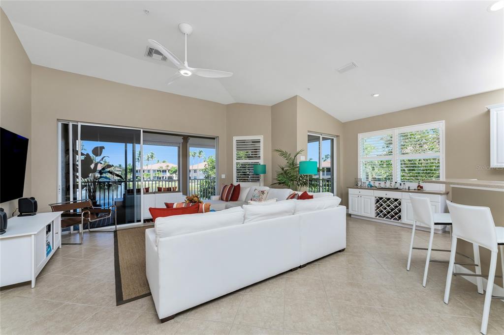 3316 Sunset Key Circle, Unit D Punta Gorda, FL 33955 - Photo 5 of 68 a living room with furniture and a large window